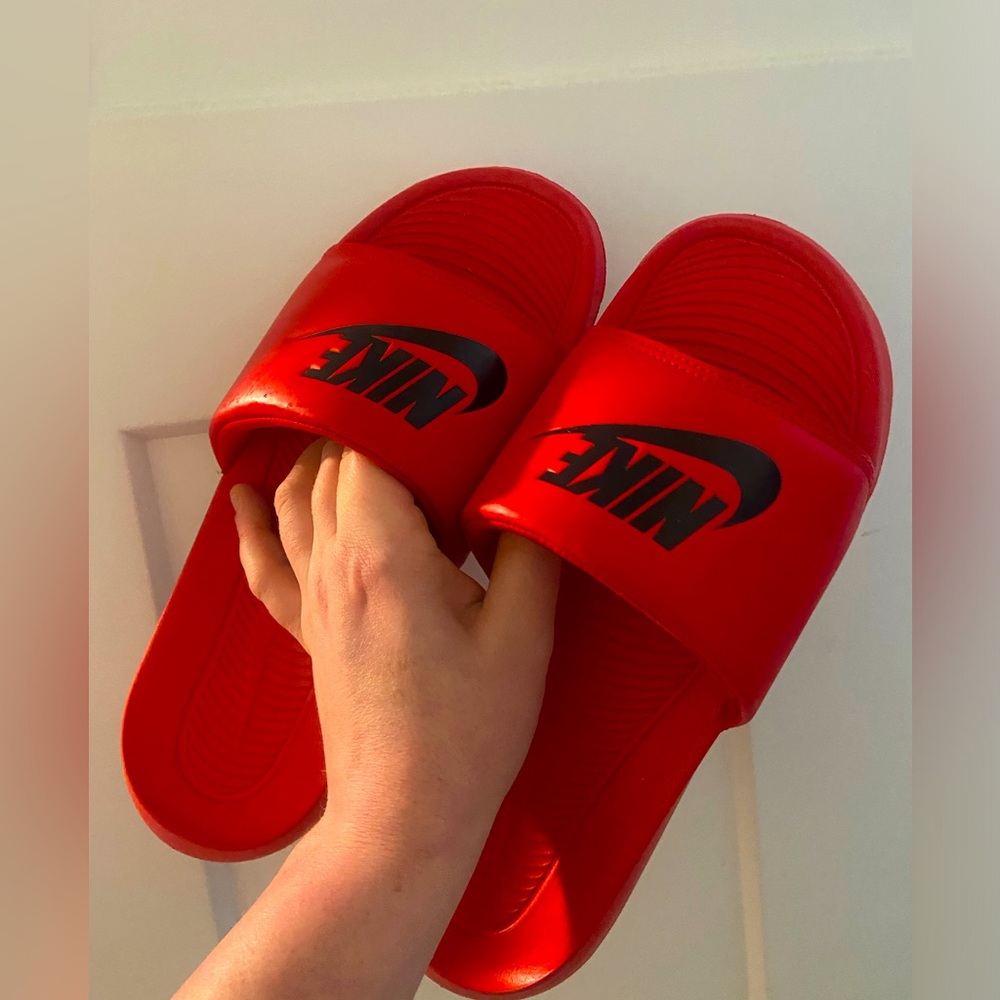 Red nike flip flops size 7
